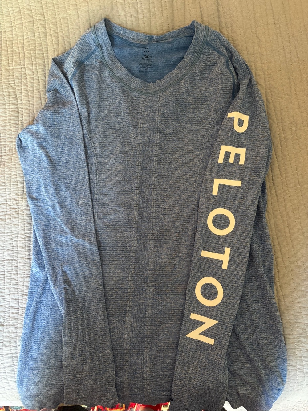 Peloton Women's Long Sleeve Tee in Heather Blue with Sleeve Logo